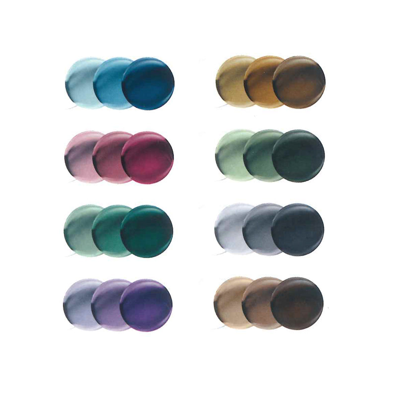 Set of colorful glass knobs on a white background